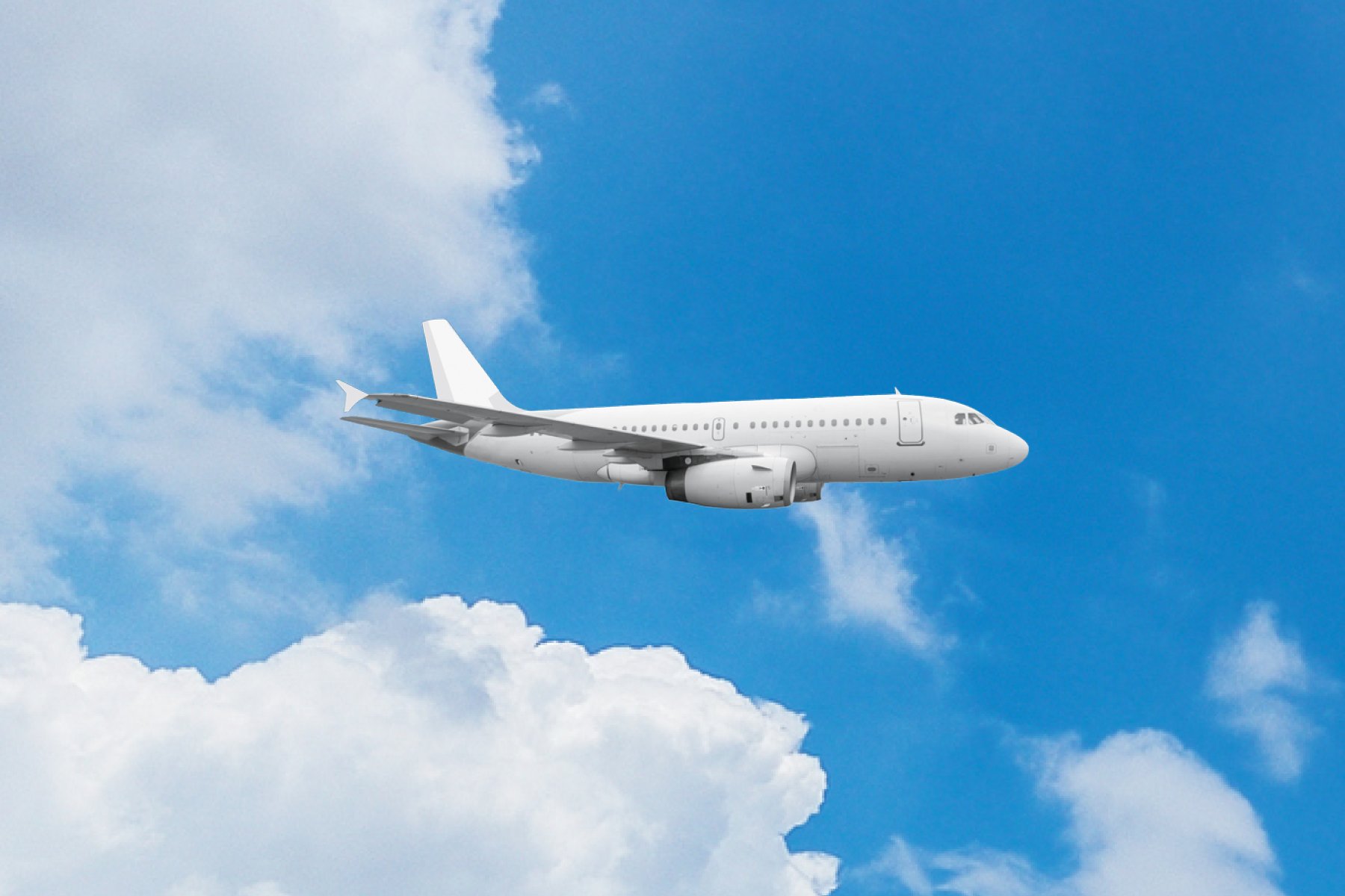 Airplane with blue sky and clouds